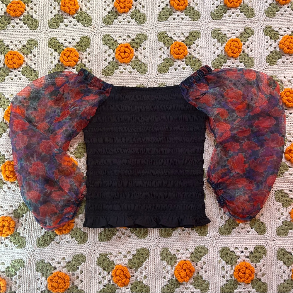 Black and floral off the shoulder blouse, size M